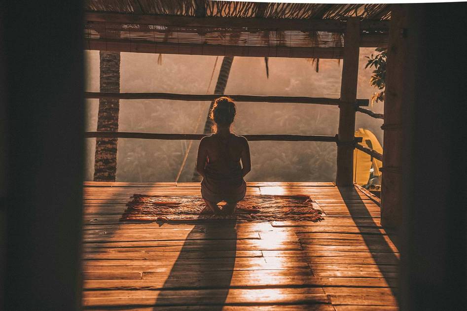 Calm wellness writer sharing breathing tips in a peaceful home office